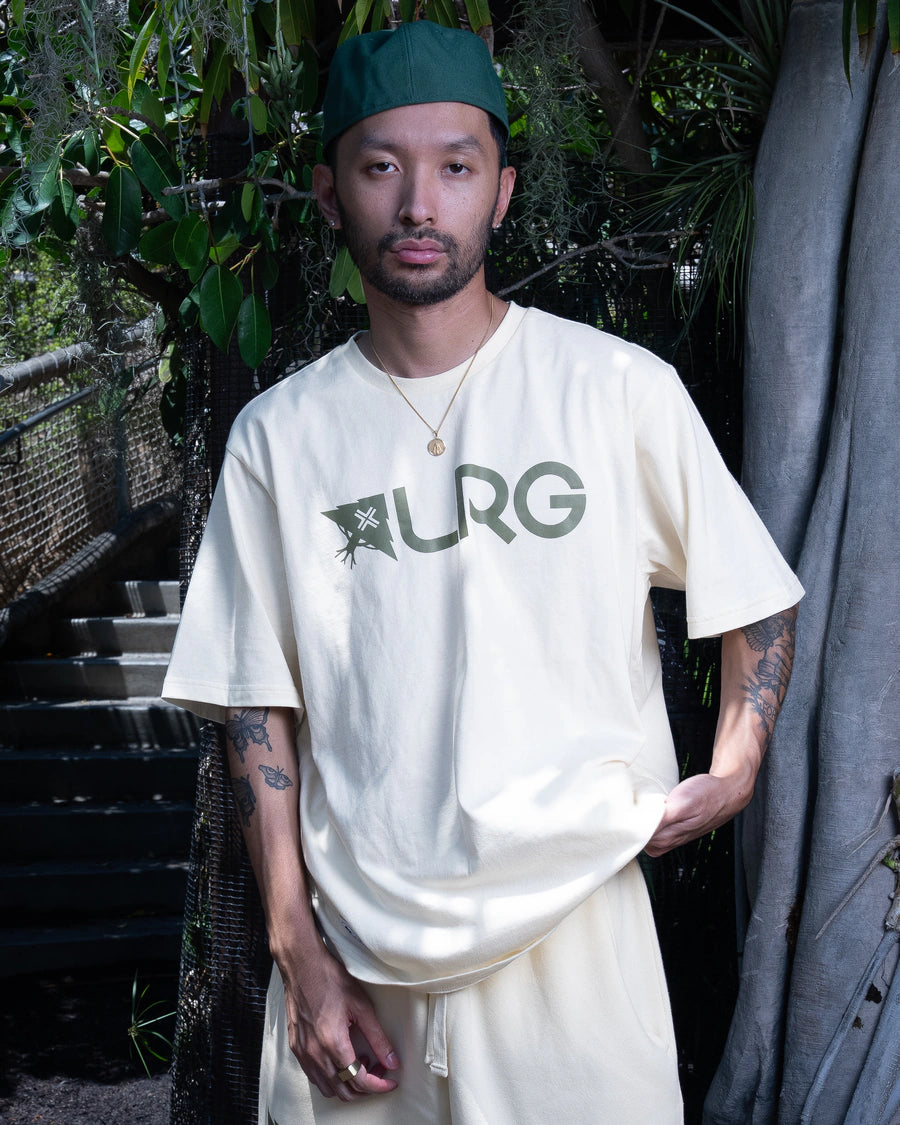 LRG customer wearing an off-white graphic tee
