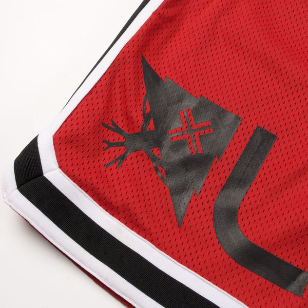 Red sports jersey with black and white accents on a white background