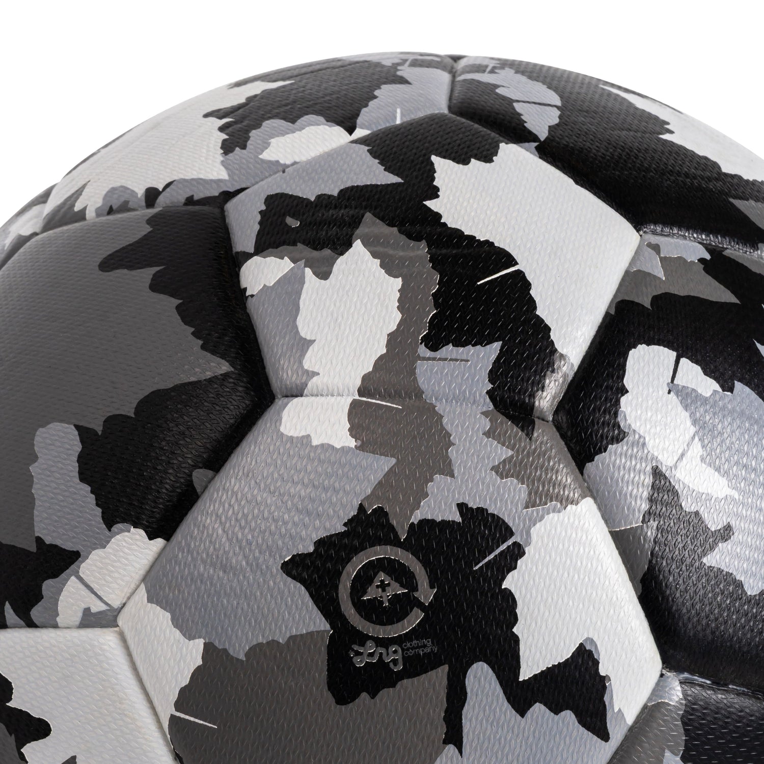 Black and white soccer ball with a camouflage pattern on a white background