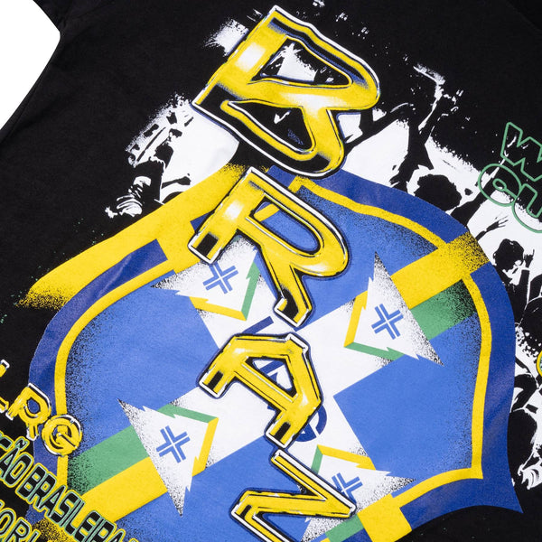 Black t-shirt with yellow and blue text and graphics on a white background