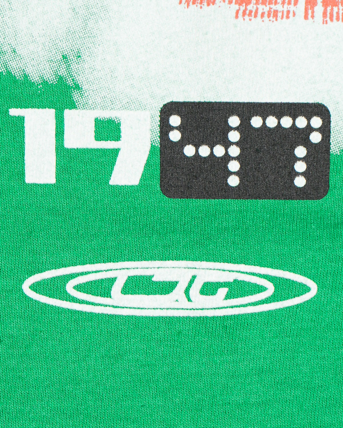 Green background with '1947' in white and a logo, featuring a brand emblem.