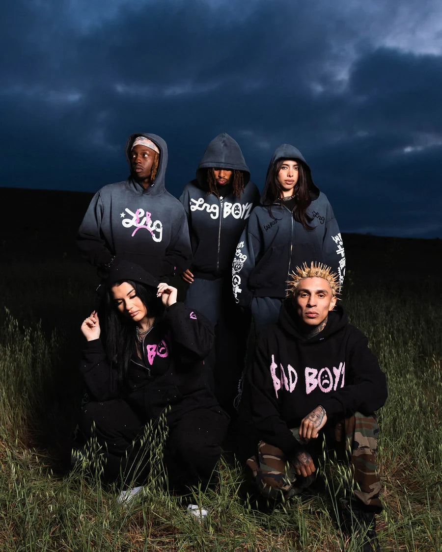 LRG customers wearing black hoodies in a field
