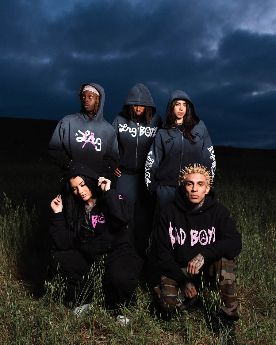 LRG customers wearing black hoodies in a field