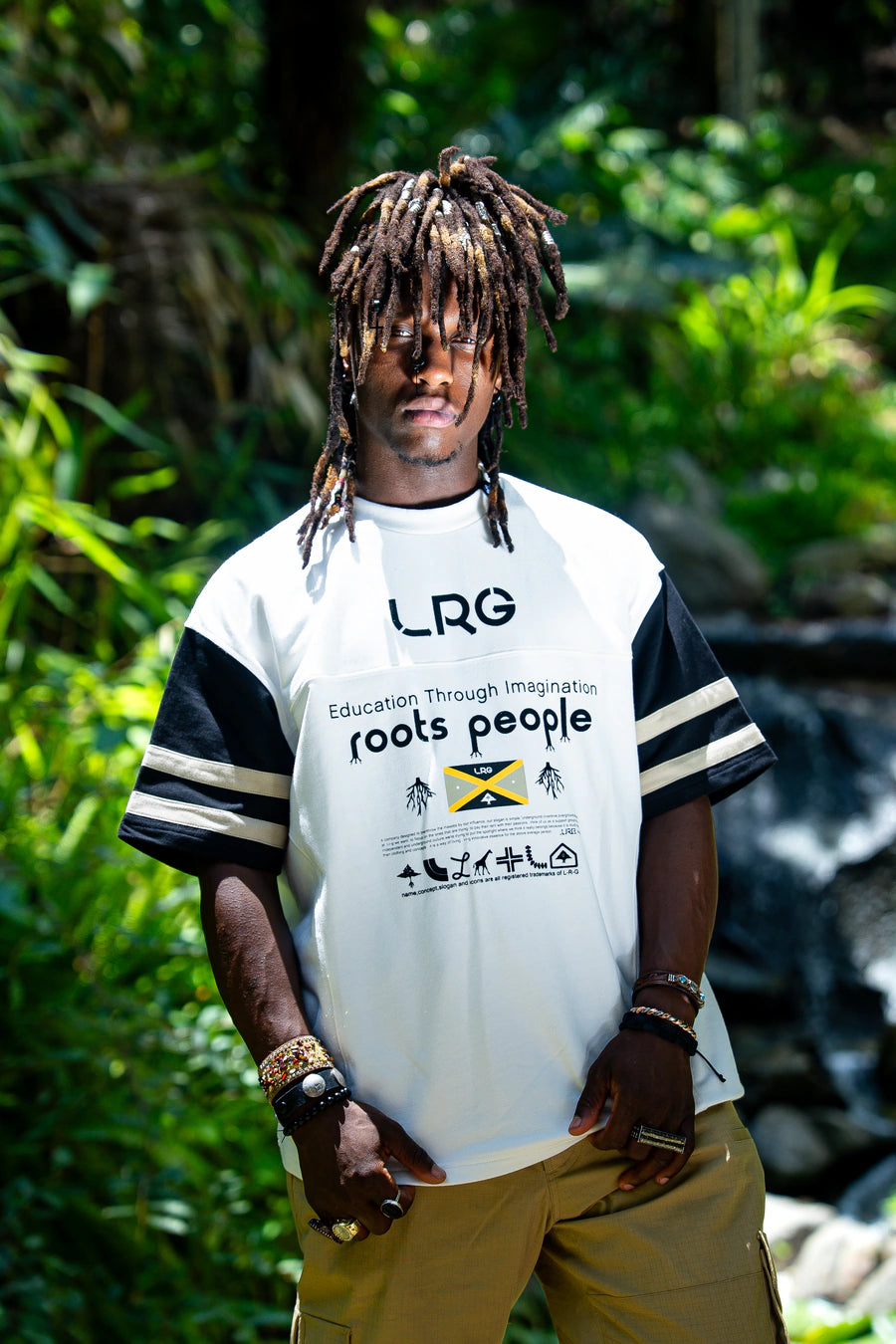 LRG customer wearing a white Roots People jersey