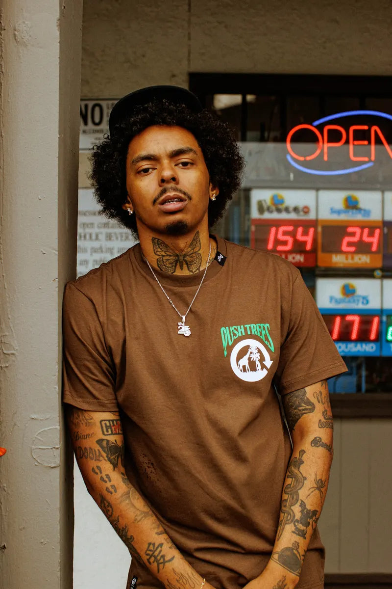 LRG model wearing a brown graphic tee